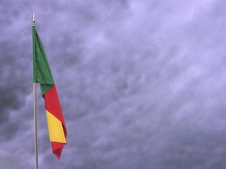 Flag of Benin hanging down dangling