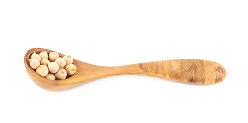 Spoon of chick peas isolated