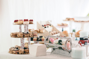 candy bar buffet with cake-stand design for luxury wedding or birthday. decorative dessert for garden party or holiday ornament