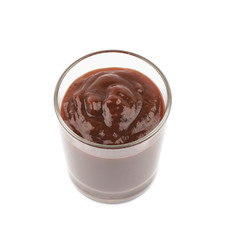 Glass shot of barbecue sauce isolated