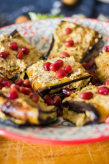 Pkhali with eggplant, walnuts, pomegranate grains. Traditional Georgian food cold appetizer. Vegan vegetarian healthy food.