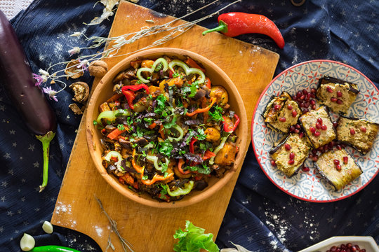 Ajapsandal vegetables stew in clay ketsi dish. Traditional Georgian food made cooked with different sorts of seasonal vegetables and greens (meat as option). Caucasus lunch with eggplant walnut pkhali