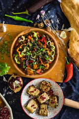 Ajapsandal vegetables stew in clay ketsi dish. Traditional Georgian food made cooked with different sorts of seasonal vegetables and greens (meat as option). Caucasus lunch or dinner. 