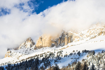 Fototapeta na wymiar Winter Clouds in Dolomites Mountains 