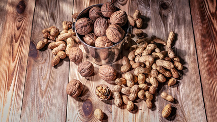 Walnuts on a wooden table. Natural sunlight from the window
