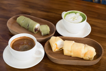 Hot Coffee and Matcha Green Tea On Wooden Table.
