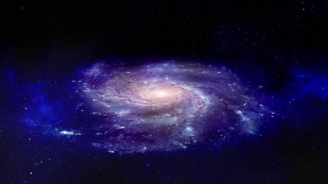 Rotating spiral galaxy surrounded by the stars in our vast Universe