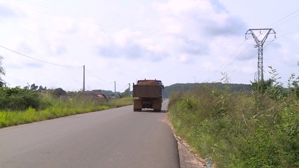 African small road outside city near Libreville in Gabon