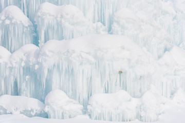Fototapeta na wymiar Waterfall frozen in the Italy, Dolomites Mountains