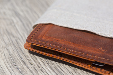 Leather Wallet on wooden table