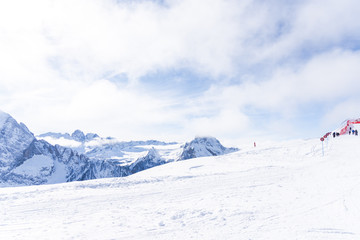 skiers in the mountains