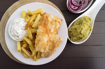 The fish and chips. A traditional English dish.