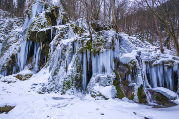 Fototapeta na wymiar Beusnita waterfall in the winter