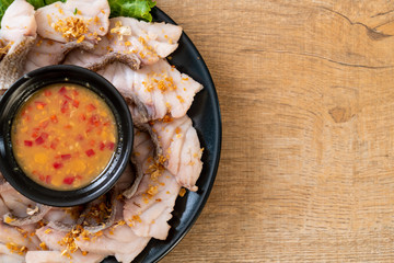 Boiled fish dip with sauce