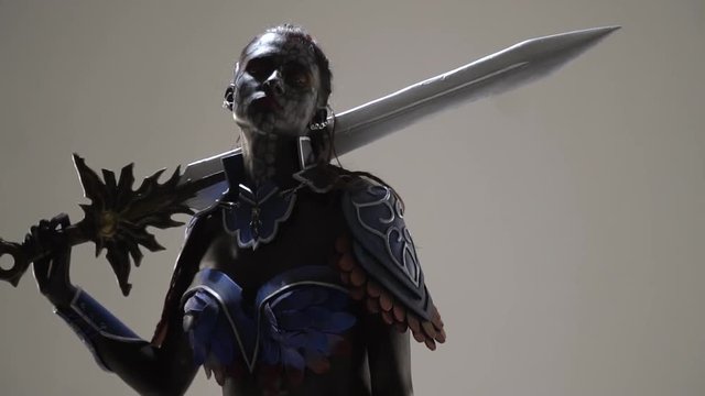 A dark elf from an anime is looking for someone