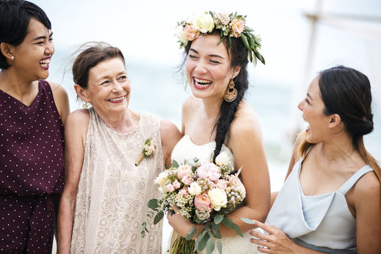 Cheerful bride at the beach