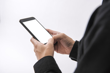 Using Mobile phone and blank screen for mockup template advertising and branding technology background.