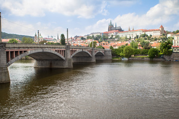 Fototapeta premium Prague Castle and Charles Bridge in Prague across the river Vltava