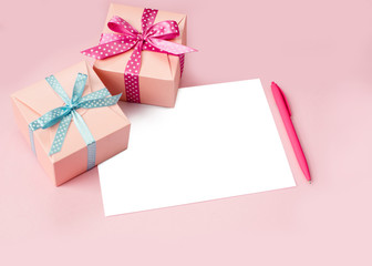 Decorated boxes and blank white sheet of paper.