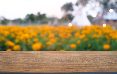 Empty dark wooden table in front of abstract blurred bokeh background of restaurant . can be used for display or montage your products.Mock up for space.