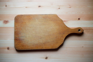 The wooden old cutting Board
