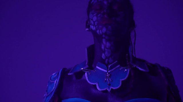 A Formidable drow woman is set to fight, slow motion