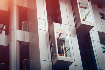 modern metal and glass elevator outside