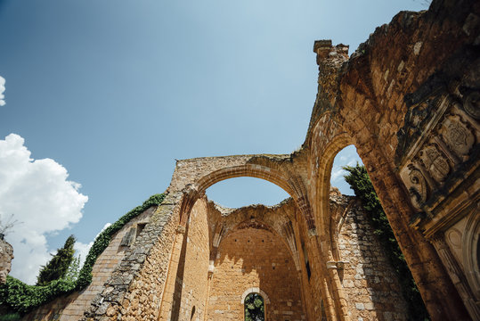 Front view of old cloister in ruins