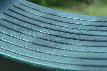 A close up of a kid's garden swing