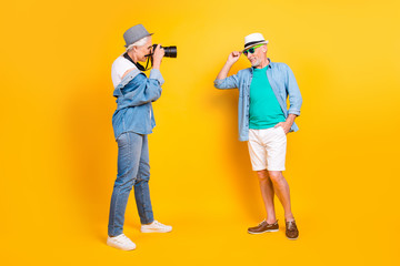 Eyewear date friends people vacation weekend holiday lifestyle concept. Full length size view photo portrait of masculine bearded sexy gentleman posing in front of cam isolated on vivid background