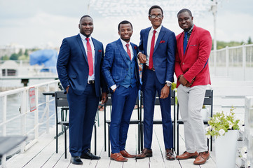 Group of four african american happy succesfull mans at suit. Rich black business mans.