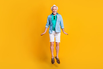 Delight rejoice emotion facial expressing enjoy victory concept. Full length size photo portrait of cute handsome lovely glad nice adorable grandpa granddad jumping up isolated bright background