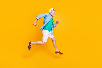Fototapeta na wymiar Healthcare cardio motion studio joy fun freedom concept. Profile full length size view photo portrait of cheerful joyful funny with bristle rejoicing gentleman running in space isolated background