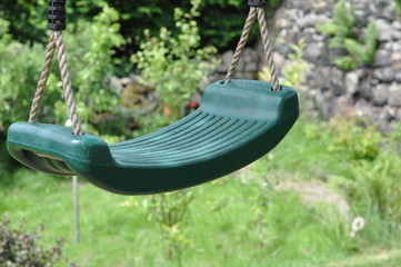 A child's green garden swing seat