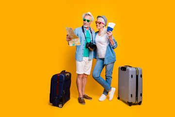 Relax leisure resort tourists journey visa honeymoon resort luggage agency concept. Full body size photo of two excited cheerful in glasses eyewear spectacles partners going abroad isolated background