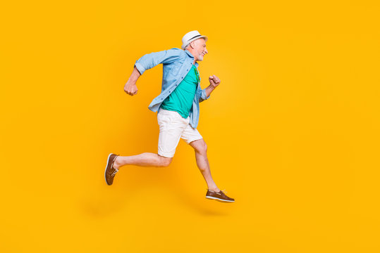 Healthcare cardio motion studio joy fun freedom concept. Profile full length size view photo portrait of cheerful joyful funny with bristle rejoicing gentleman running in space isolated background