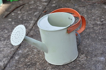 A kids garden watering can