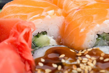 Salmon and caviar rolls served on a plate