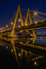 Millenium bridge in Kazan, reflected in the waters of the river Kazanka. Russia