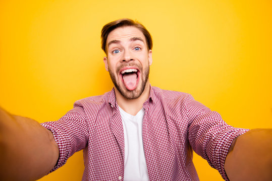 Comic humorous positive people good mood person feelings emotions make take trip concept. Close up portrait of mad excited cheerful funky man having fun isolated on bright background