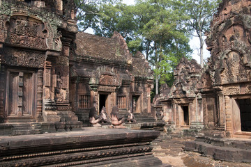 Angkor Cambodia, Monkey and lion guardians sitting at entrances of the sanctuary at the 10th century Banteay Srei temple
