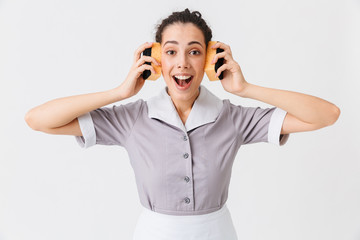 Portrait of an excited young housemaid