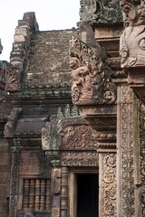 Fototapeta na wymiar Angkor Cambodia, carvings of garuda the bird man at the 10th century Banteay Srei temple
