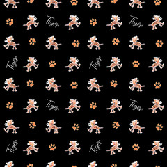 Seamless pattern with a cute tigers.
