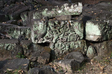 Angkor Cambodia, pile of rubble containing carved sandstone blocks at the 12th century Preah Khan temple