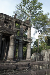 Angkor Cambodia, ruins of a two storey building with columns at the 12th century Preah Khan temple complex