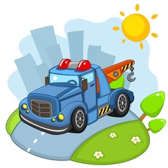 Fototapeta premium A large cargo building blue car with large wheels and headlights and a siren rides on the road in the city.