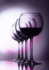 Glasses of red wine.