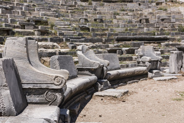 Seats of the Nobles in theatre in Priene Ancient City in Turkey