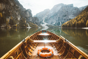 Traditional rowing boat at Lago di Braies in the Dolomites